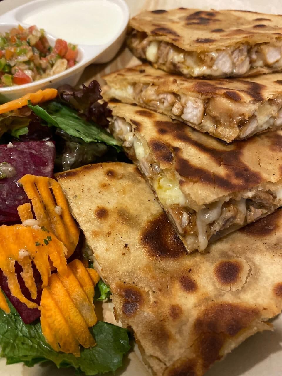 Stacked quesadilla wedges with grilled vegetables